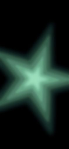 an abstract green star on a black background