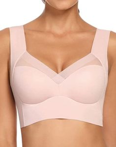 a woman wearing a pink bra top with her breast exposed in the shape of a triangle