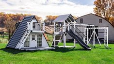 a house with a slide in the yard