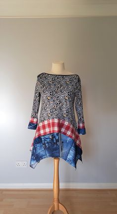 "One of a kind upcycled tunic dress made from upcycled  top and cotton fabrics.  Top part is soft and very stretchy and will fit sizes M-  XL. Asymmetrical bottom. Can be worn with jeans or leggings. Size L Measurements bust - 41\" and stretches easily  length - 32- 37\" Wash by hand or in washing machine in 30 degrees on wrong side. There is a lot of outstanding designs in different sizes in my shop www.etsy.com/uk/shop/BosaHandmade?ref=hdr_shop_menu Link to my new shop with crochet items https Fitted Long Sleeve Lagenlook Tunic, Fitted Lagenlook Long Sleeve Tunic, Bohemian Patchwork Tunic Dress, Blue Bohemian Free-size Tunic, Recycled Costumes, Oversized V-neck Bohemian Tunic, Bohemian Spring Tunic With 3/4 Sleeves, Boho Plus Size, Spring V-neck Lagenlook Tunic