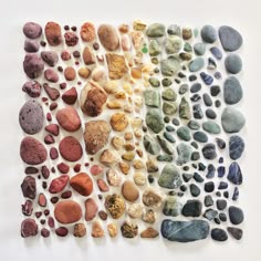 several different rocks arranged in the shape of a rainbow