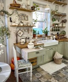 a kitchen filled with lots of counter space and decor