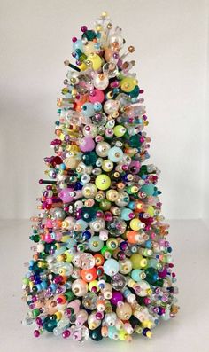 a colorful christmas tree with ornaments on it