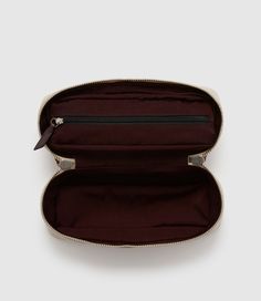 Editor's Notes:The One Day Toiletry Bag elegantly holds your daily necessities. With a waterproof cloth interior, it also features a water-resistant exterior and a zippered compartment under its lid to separate smaller items. Travel Cases With Removable Pouch, Classic Travel Case With Removable Pouch, Luxury Cases With Removable Pouch, Rectangular Travel Case With Zipper Closure, Luxury Cases With Removable Pouch For Everyday Use, Rectangular Travel Cases With Zipper Closure, Luxury Rectangular Travel Accessories Case, Classic Cosmetic Bag With Zipper Closure For Travel, Classic Cosmetic Bag With Zipper For Travel