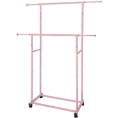 a pink garment rack on wheels with two arms and one arm extended to the side