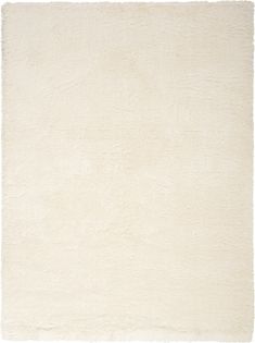 a white rug with fringes on it