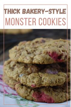 three cookies stacked on top of each other with the words thick bakery - style monster cookies