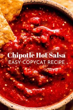 chipotle hot salsa in a bowl with tortilla chips