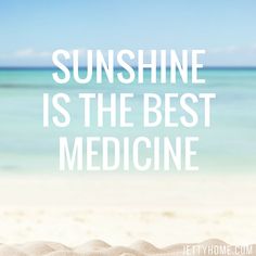 the words sunshine is the best medicine are written in white letters on a beach sand