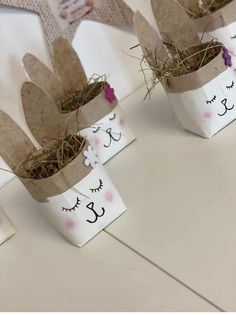 some bunny ears are sitting in small pots