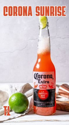 a bottle of corona sunrise next to a lime