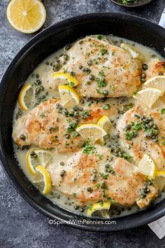 chicken with lemons and capers in a skillet