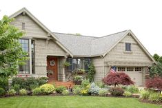 a house with landscaping in the front yard