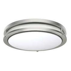 a round light fixture on a white background