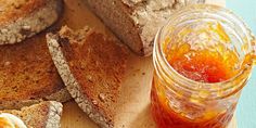 sliced bread and jam on a cutting board