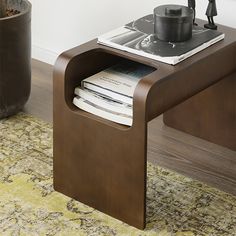 a table with magazines and a record player on it