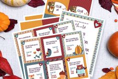 several cards with words on them sitting next to autumn leaves and pumpkins in the background