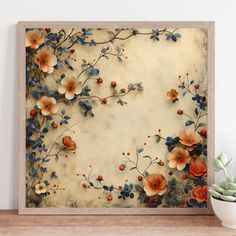 an art work with flowers and leaves on the wall next to a potted plant