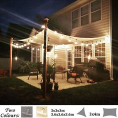 an outdoor patio covered in lights and surrounded by lawn furniture, with the words two colours above it