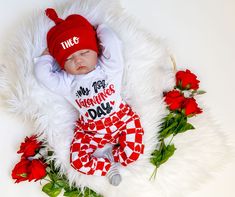 "Adorable 1st Valentine's Day outfit for baby! Bodysuit features our original 1st Valentine design (It's hand lettered, not a font!). Listing includes your choice of: - White bodysuit with \"My 1st Valentine's Day\" - Handmade heart Check Slim Jogger Pants - Handmade red knot hat, with name added (white, smooth caps) ** Personalization ** Writing is matte vinyl, with a font that's all capital letters.  We do have other fonts by request.   The name is added to the hat, not the bodysuit, and is op Baby Boy Valentines Day Outfit, Valentines Newborn, Baby Boy Valentine Outfit, Baby Valentines Day Outfit, Boys Valentines Outfit, Baby Valentines Outfit, Kawaii Clothes Goth, Holiday 2024, Valentines Day Baby