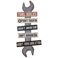 a metal sign that says tool rules and don't move them, don't even look at me