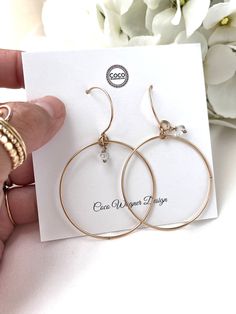 Just as effortless as they are simple, these hoop earrings are an essential everyday piece. Item Details: • This listing is for A PAIR ( 2 pieces ) earrings.• All metal is components are sterling silver and 14k gold-fill• Hoops measure 40mm in diameter.• Herkimer quartz crystals prized, each Herkimer diamond is a natural entity and no stone is identical.• The order will arrive in a gift-wrapped box and free polishing cloth. It will be ready for gift giving. All our work is custom-made by hand in Nickel-free Small Hoop Earrings In 14k Gold Filled, Simple Small Hoop Everyday Jewelry, Small Hoop 14k Gold Filled Earrings For Gift, Gold-toned Sterling Silver Hoop Earrings For Everyday Elegance, Gold Sterling Silver Hoop Earrings For Everyday Elegance, 14k Gold Filled Small Hoop Earrings As Gift, Delicate Sterling Silver Hoop Earrings In Yellow Gold, Gift Small Hoop Earrings 14k Gold Filled, Tarnish Resistant Hoop Earrings For Everyday