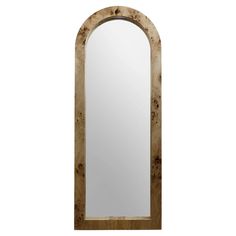 an arched mirror is shown against a white background and has wood trim around the edges