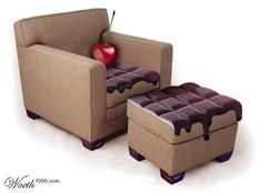 a chair and ottoman with an apple on it