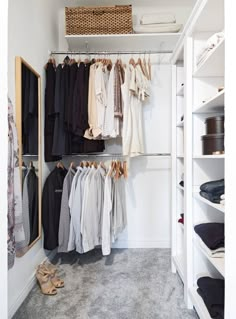 an organized closet with clothes and shoes