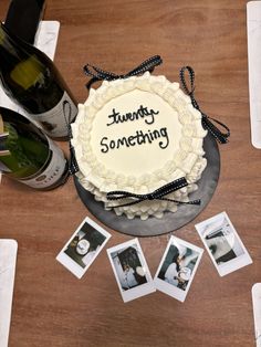 there is a cake on the table with wine bottles and pictures around it that say, twenty something