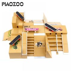 a cardboard model of a skateboard shop with two skateboards on the top shelf