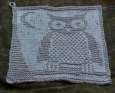 a crocheted dishcloth with an image of a cat on the front and side