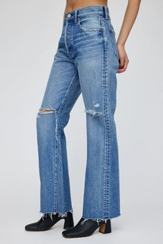 Light blue high rise flare jeans Denim has fading detail with knee ripping Slight piping detail around the waist Button closure Raw step hem Shoe Chart, High Rise Flare Jeans, Cotton Labels, Mama Style, Japanese Denim, Vintage Fits, Denim Flares, Denim Fabric, Denim Shop