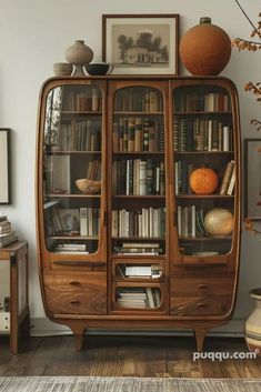 an old bookcase with many books on it