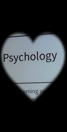 a heart - shaped shadow is seen in front of a sign that reads,'psychology coming soon '