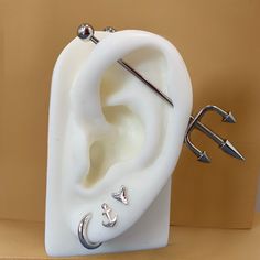 an ear shaped like a hook and some hooks