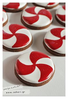 cookies with red and white icing on them