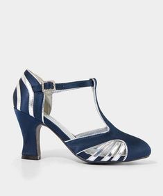 These T bar shoes bring a touch of vintage style. In rich navy satin with silver piping to elevate the cutout detail, we love how the diamante buckle adds that elegant finishing touch. With the handbag to match, these shoes will transform any outfit into stunning Gatsby era glam. T bar shoes Made with satin Statement diamante buckle Pretty cutouts and ankle strap fastening Feminine flared heel Matching handbag availableHeel Height: 8.5 cm T Bar Shoes, Fantasy Wardrobe, Sportswear Fashion, Fancy Dress Accessories, Fancy Dress For Kids, Joe Browns, 50s Fashion, Boots For Sale, Vintage Shoes