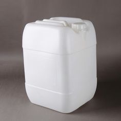 a large white plastic container sitting on top of a table