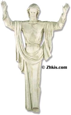 a statue of jesus holding his hands up