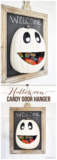 two pumpkins with faces painted on them and the words welcome to halloween candy door hanger