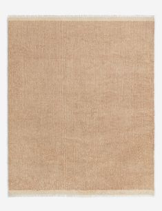 a beige rug with fringes on the top and bottom, against a white background