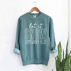 Looking for a cute versatile top to wear? Make sure to grab one of our Graphic Sweatshirts! This soft and comfortable shirt is the perfect top for any outfit. It can be paired with biker shorts, Jeans, or the classic stay at home sweats! This sweatshirt is true-to-size, so be sure to order your regular size! If you are looking for a more oversized look, make sure to size up. Cute Sweaters With Sayings, Holiday Sweatshirt Ideas, Winter Sweatshirt Designs, Distressed Cotton Top For Winter, Blue Distressed Sweatshirt Relaxed Fit, Blue Distressed Relaxed Fit Sweatshirt, Comfy Blue Cotton Tops, Winter Soft-washed Relaxed Fit Tops, Acid Wash Tops With Letter Print For Loungewear