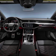 the interior of an all - new audi q4 suv with red stitching and black leather seats