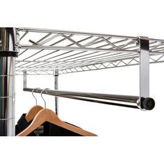 a metal rack with clothes hanging on it