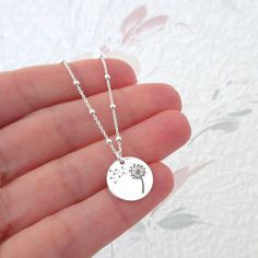 engraved dandelion round pellet pendant necklace on fine satellite chain: material: 925/1000 silver chain width: 1 mm pendant diameter: 1.4 cm 2 lengths to choose from: *40cm(=15.7") *45cm(=17.7") average weight: 2.90 gr hallmarked item shipping within 24 hours Dandelion Necklace, Dandelion Flower, Average Weight, Engraved Necklace, Flower Jewellery, Favorite Jewelry, Silver Chain, Dandelion, Jewelry Necklace Pendant