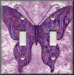 a purple butterfly light switch plate cover