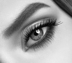 a woman's eye with long lashes