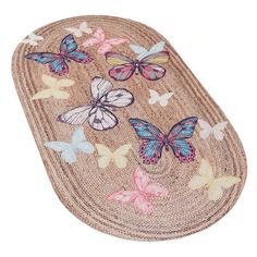 an oval shaped rug with butterflies on the top and bottom, is shown in multicolors