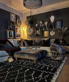 a living room filled with lots of furniture and pictures on the wall above it's coffee table